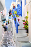 Fototapeta Uliczki - Beautiful whitewashed street in the old town of Mykonos, Greece