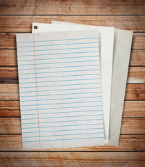 Poster - stack of old paper on wood textures background