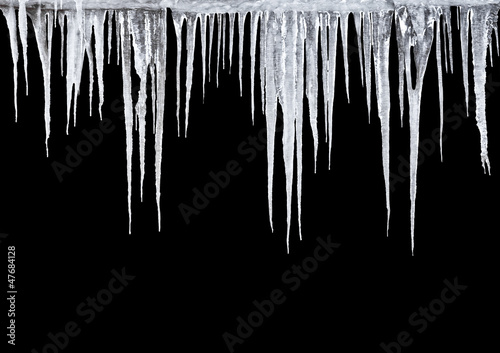 Fotomural Icicles on a black background