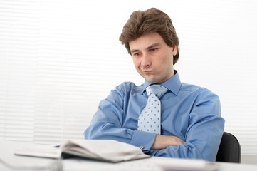 Wall Mural - Portrait of a pensive young businessman