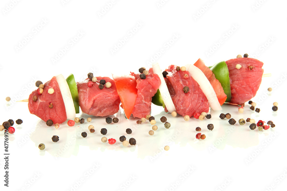 Raw beef meat and vegetables on skewer isolated on white