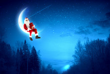 Photo Of Santa Claus Sitting On The Moon