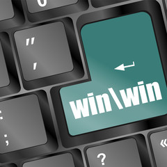 Poster - A green key on a computer keyboard with the words win