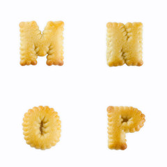 Fototapete - crackers in the form of the alphabet : M-P