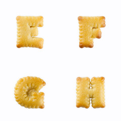 Fototapete - crackers in the form of the alphabet : E-F