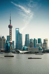 Wall Mural - shanghai pudong against a blue sky