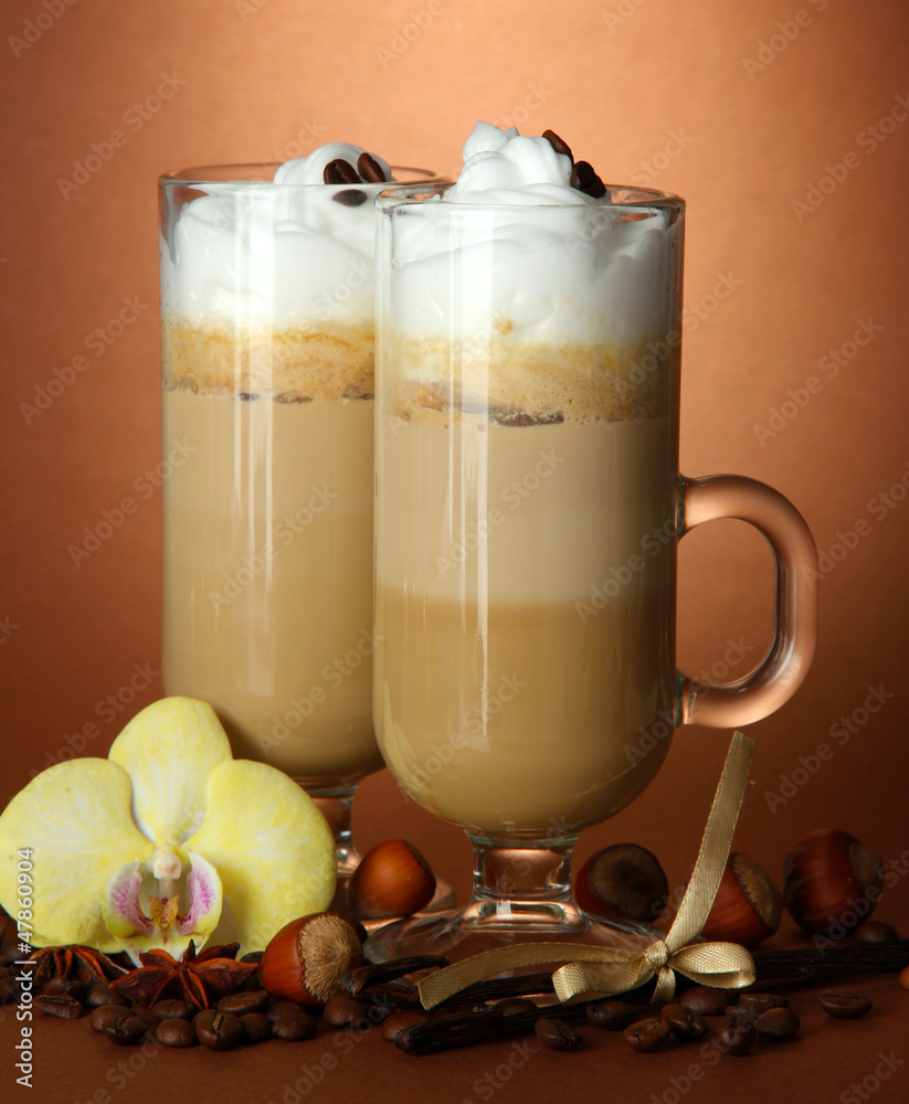 Fragrant coffee latte in glasses cups with spices,