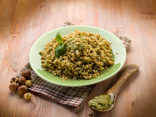 Canvas Print - spelt with pesto sauce and hazel nut, vegetarian food