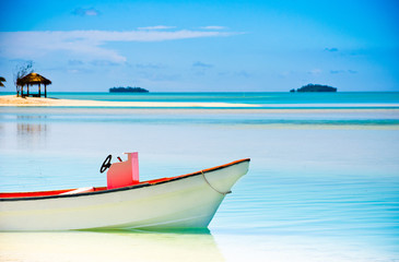 Wall Mural - Beautiful Tropical Lagoon with boat in foreground