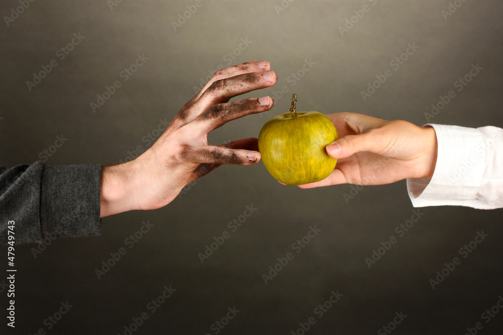 helping the homeless, on black background close-up