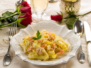 Poster - tagliatelle with salmon and cream sauce on luxury table