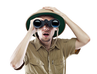 amazed explorer looking through binoculars
