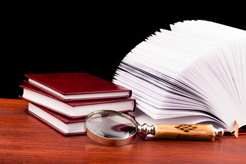 Wall Mural - books of justice and magnifying glass on wooden table