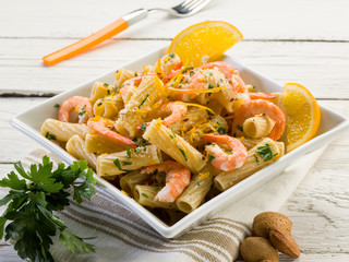 Wall Mural - pasta with shrimp orange peel and almond