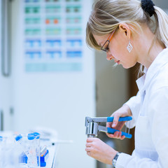 female researcher carrying out research experiments