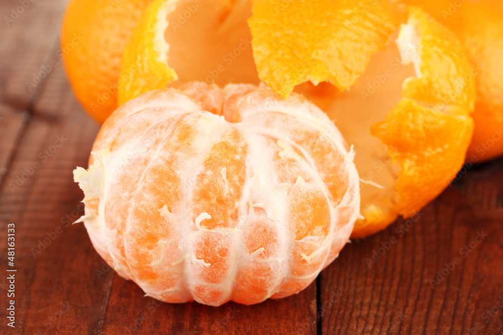 Tasty mandarines  on wooden background