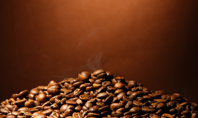 Poster - coffee beans on brown background