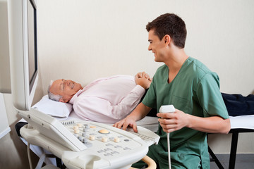 Radiologic Technician Smiling At Patient