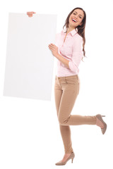 Poster - Beautiful woman holding blank board