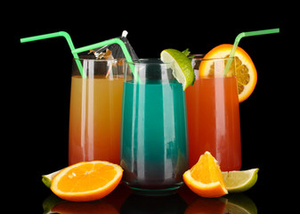 Three cocktails isolated on black