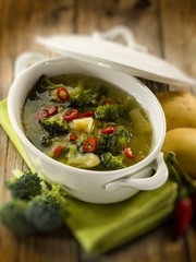 Wall Mural - soup with broccoli and potatoes, selective focus