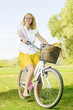 happy young woman on the bicycle