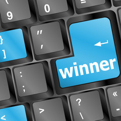 Poster - key on a computer keyboard with the words winner