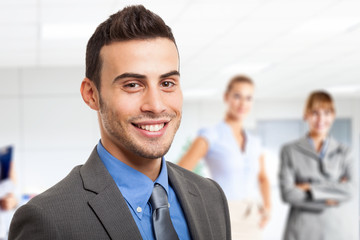 Wall Mural - Smiling businessman portrait