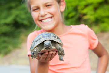 young girl and turtle