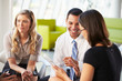 © Monkey Business - Businesspeople With Digital Tablet Having Meeting In Office