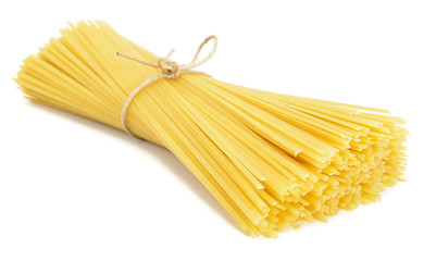 Wall Mural - Heap of linguine pasta isolated on white background