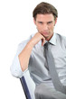 © auremar - Young businessman leaning on his chair