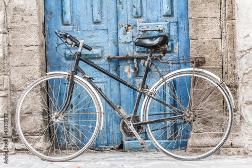 Naklejka na meble White bike in front of a shop in Marrakesh,Morocco