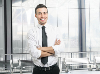 Wall Mural - Handsome smiling businessman portrait