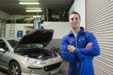 Poster - Confident male mechanic with spanner