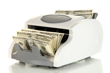 Machine for counting money and 100 dollar bills isolated