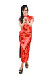 pretty women with Chinese traditional dress Cheongsam and drinki
