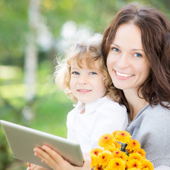 Sticker - Family using tablet PC outdoors