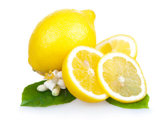 Wall Mural - Yellow lemon fruits with leaves and slices isolated