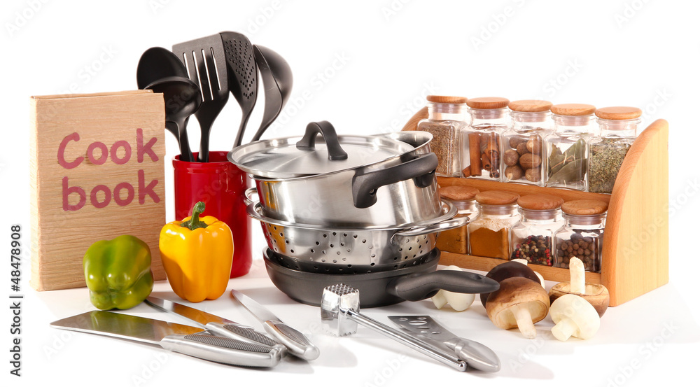 composition of kitchen tools,spices and vegetables isolated