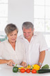 © WavebreakmediaMicro - Elderly couple preparing vegetables