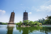 Banyan Lake Pagodas, Guilin, China ,one Represents The Sun,