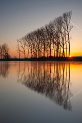 Canvas Print - Symmetry reflection on the autumn river