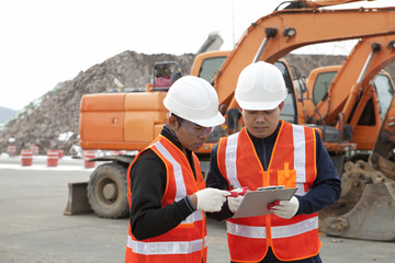 Wall Mural - construction worker and excavator