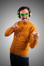 Guy With Headphones Listening To Music