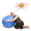 © Kletr - Overweight woman relaxing and dreaming.