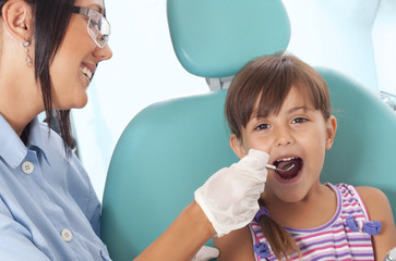 dentist and little girl