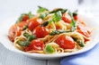 Spaghetti with cherry tomatoes and green asparagus
