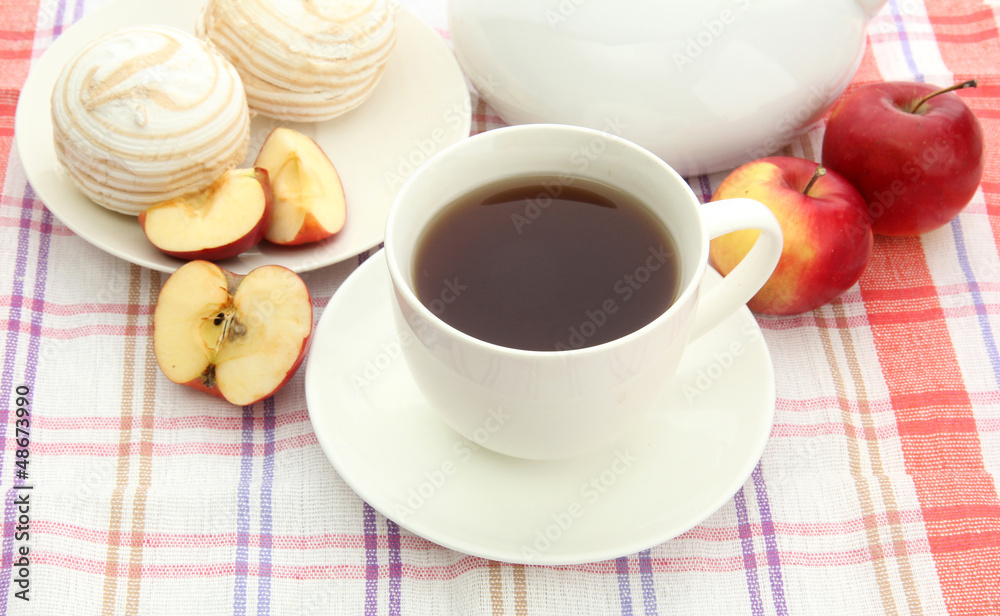 light breakfast with tea and homemade jam, on tablecloth