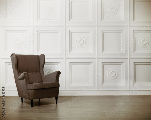 Fotomural One classic armchair against a white wall and floor